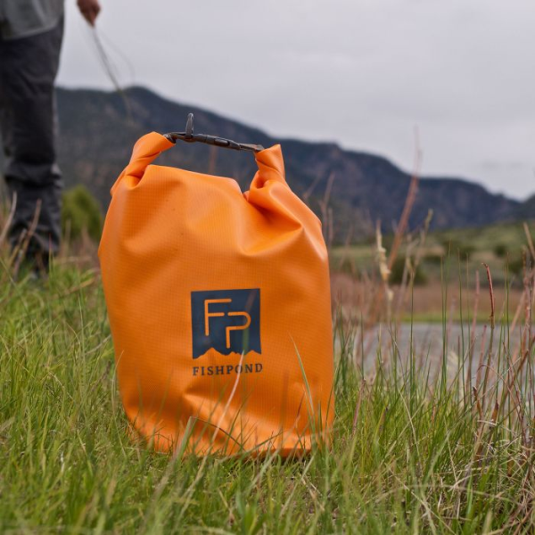 Fishpond Thunderhead Roll-Top Dry Bag Cutthroat Orange Action Fishpond Thunderhead Roll-Top Dry Bag Cutthroat Orange Action